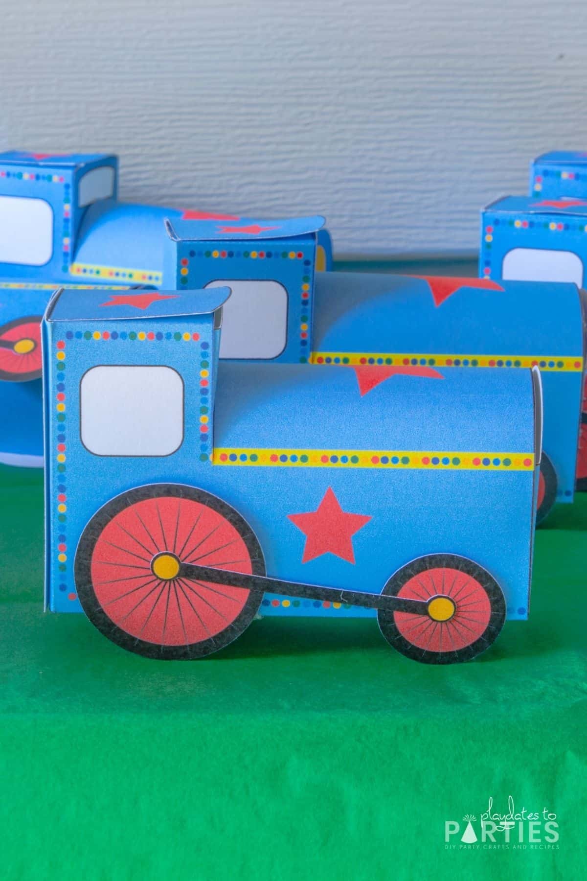 Front view of a finished train party favor box on display for a birthday party
