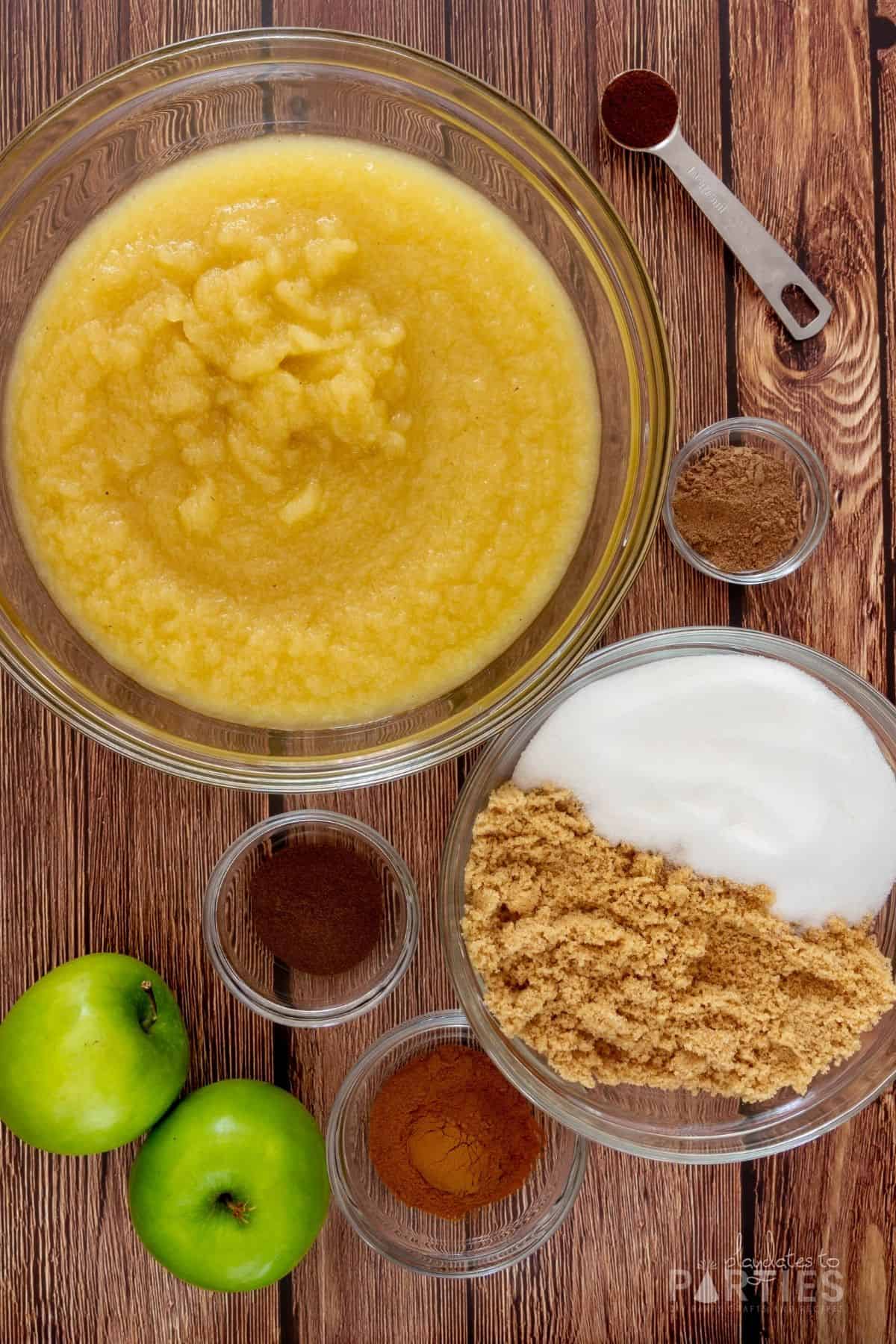Ingredients for making easy crock pot apple butter with applesauce