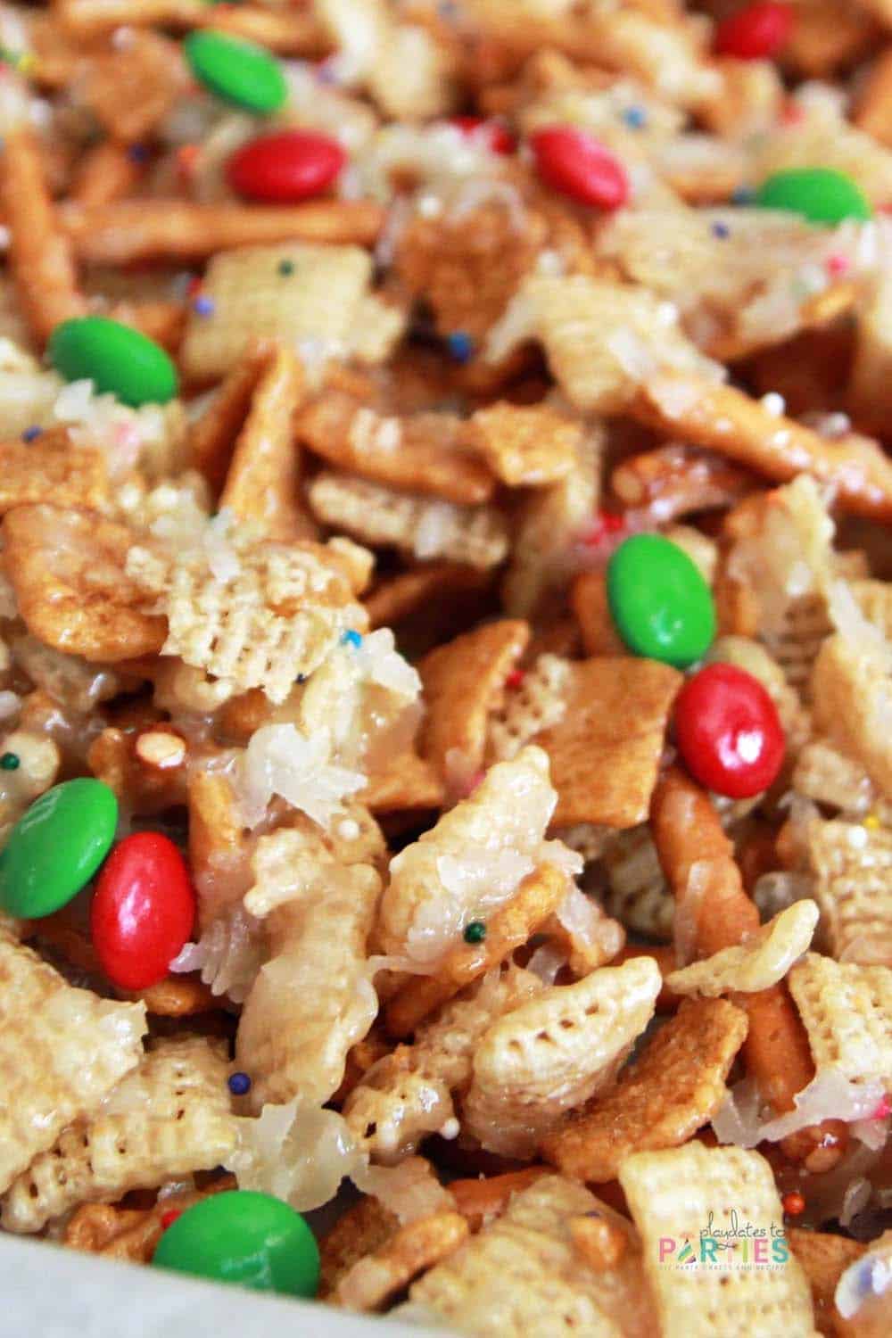 Close up image of candied Chex Mix.
