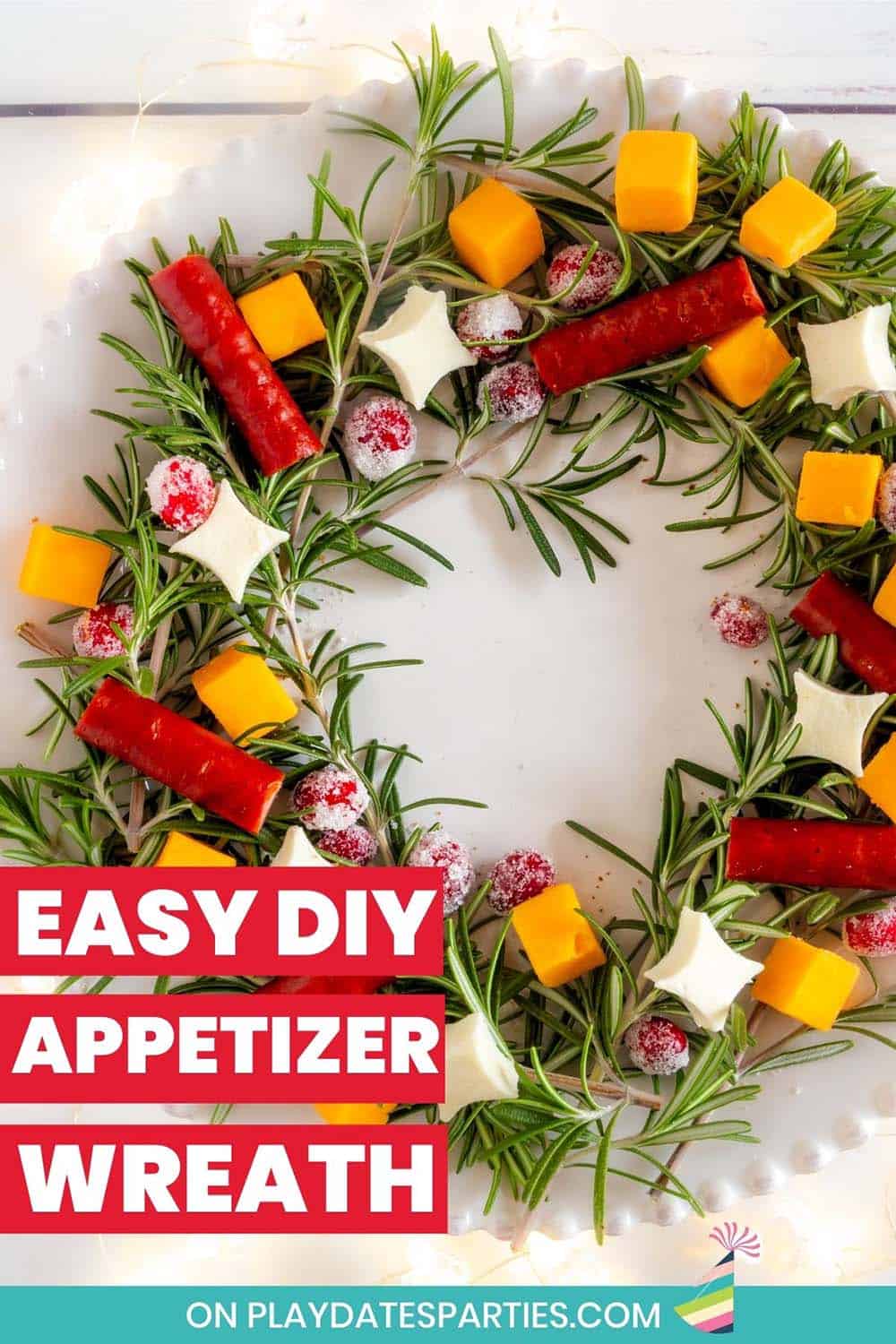 Cheese and meats on a circular bed of rosemary with the text easy DIY appetizer wreath.