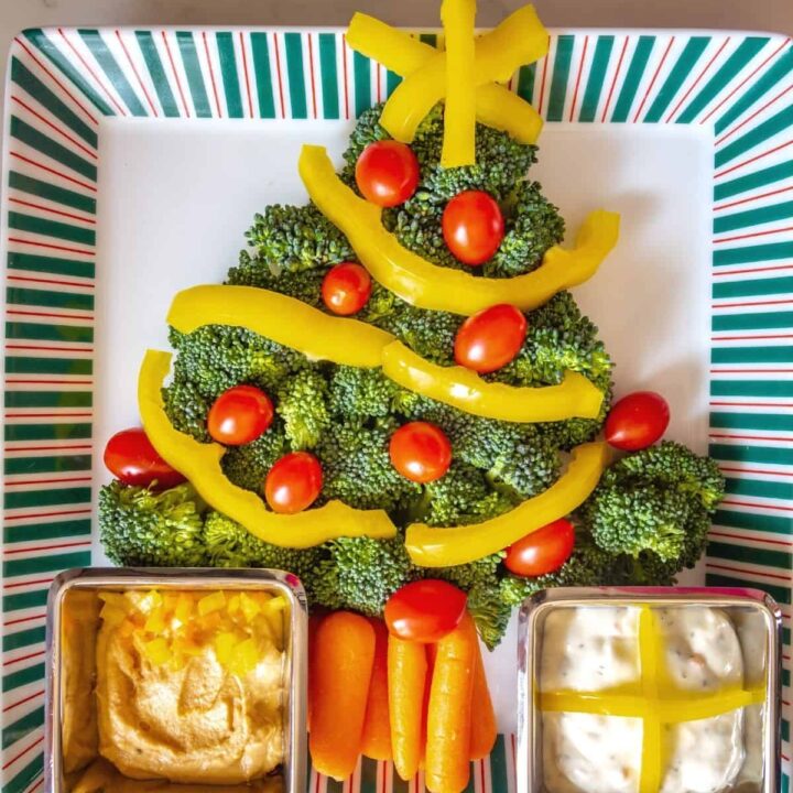 Christmas tree veggie platter for kids on a square platter.