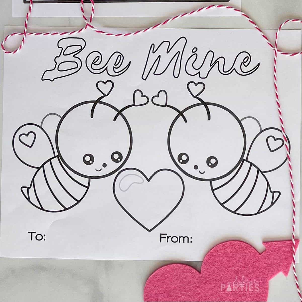 A printed coloring sheet that says Bee Mine.