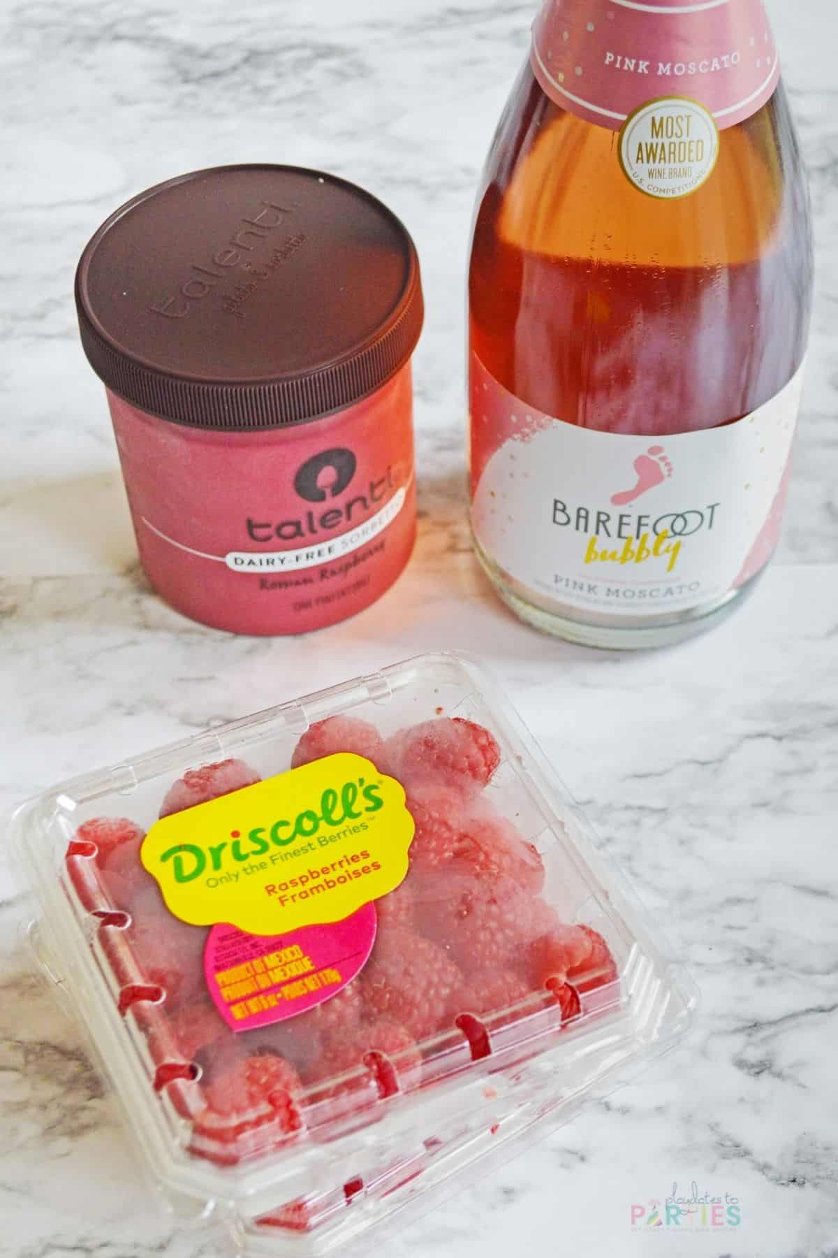 Ingredients needed for raspberry sorbet pink champagne floats.