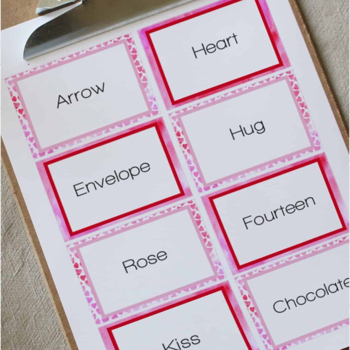 Charades cards in pink and red.