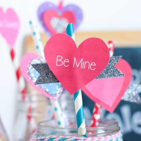 Heart shaped decorations on a paper straw.