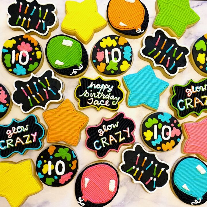 Overhead view of colorful cookies for a glow in the dark party.