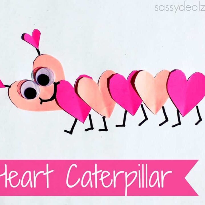 A cute caterpillar kids craft made out of pink paper hearts.