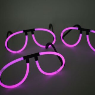 Eyeglasses made out of pink glow sticks.