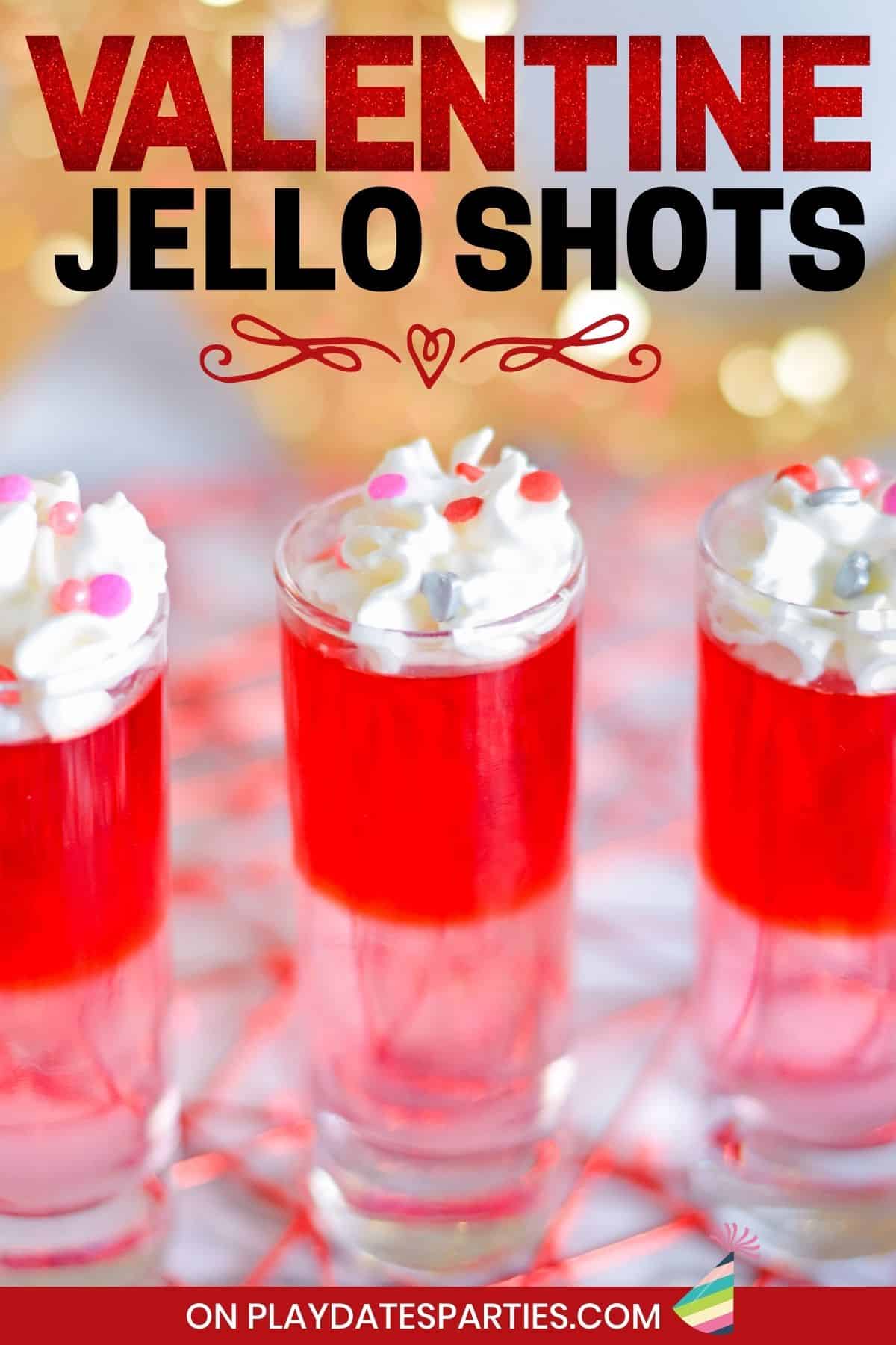 Close up of finished jello shots with text Valentine jello shots.
