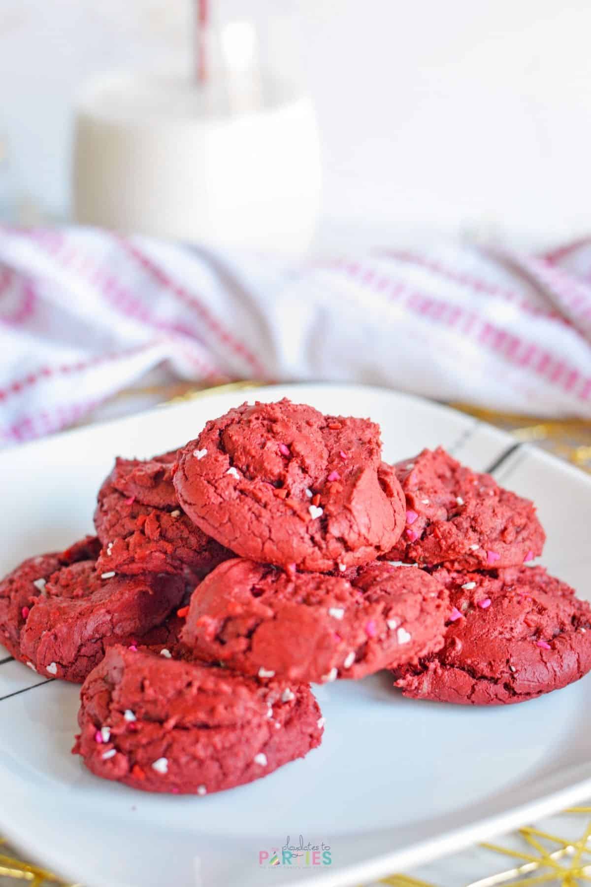 Red velvet cookies made with cake mix on a white plate.