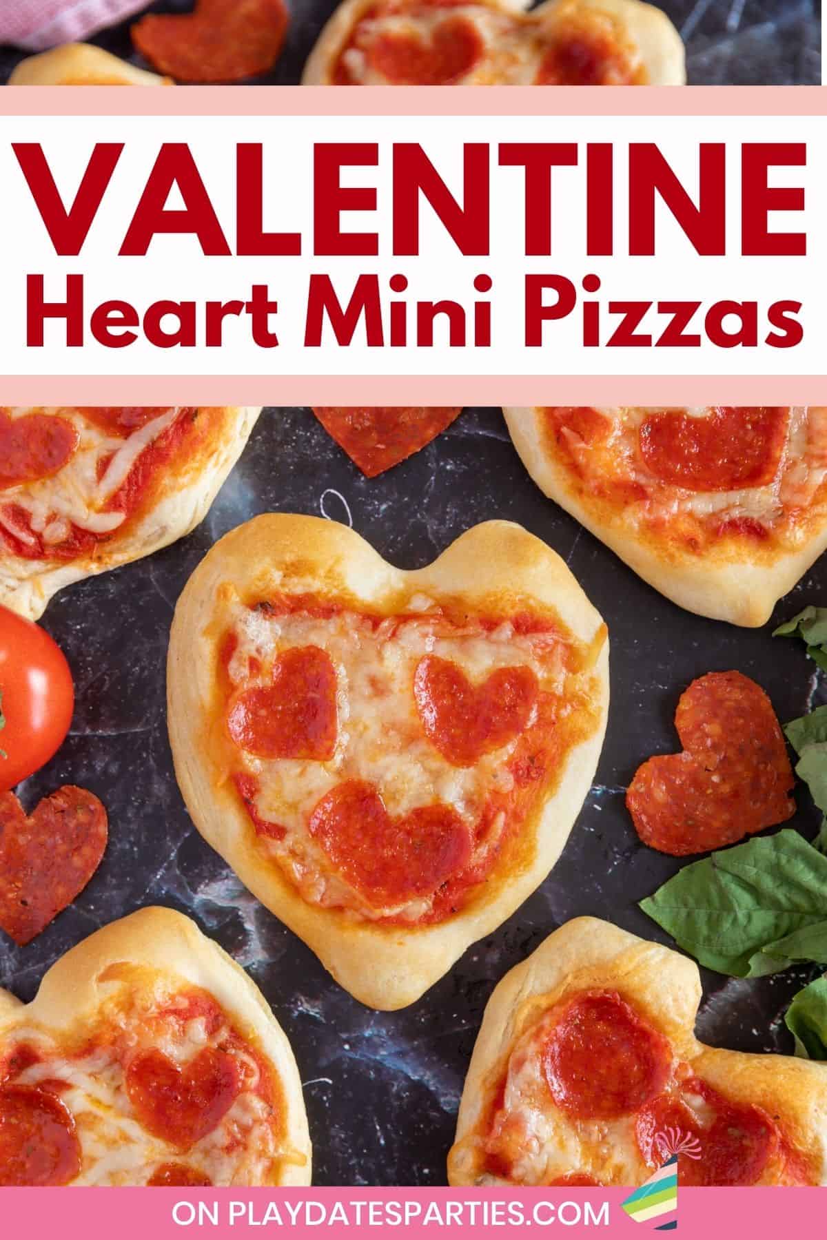 Pizzas on a marble surface with text overlay Valentine Heart Mini Pizzas.