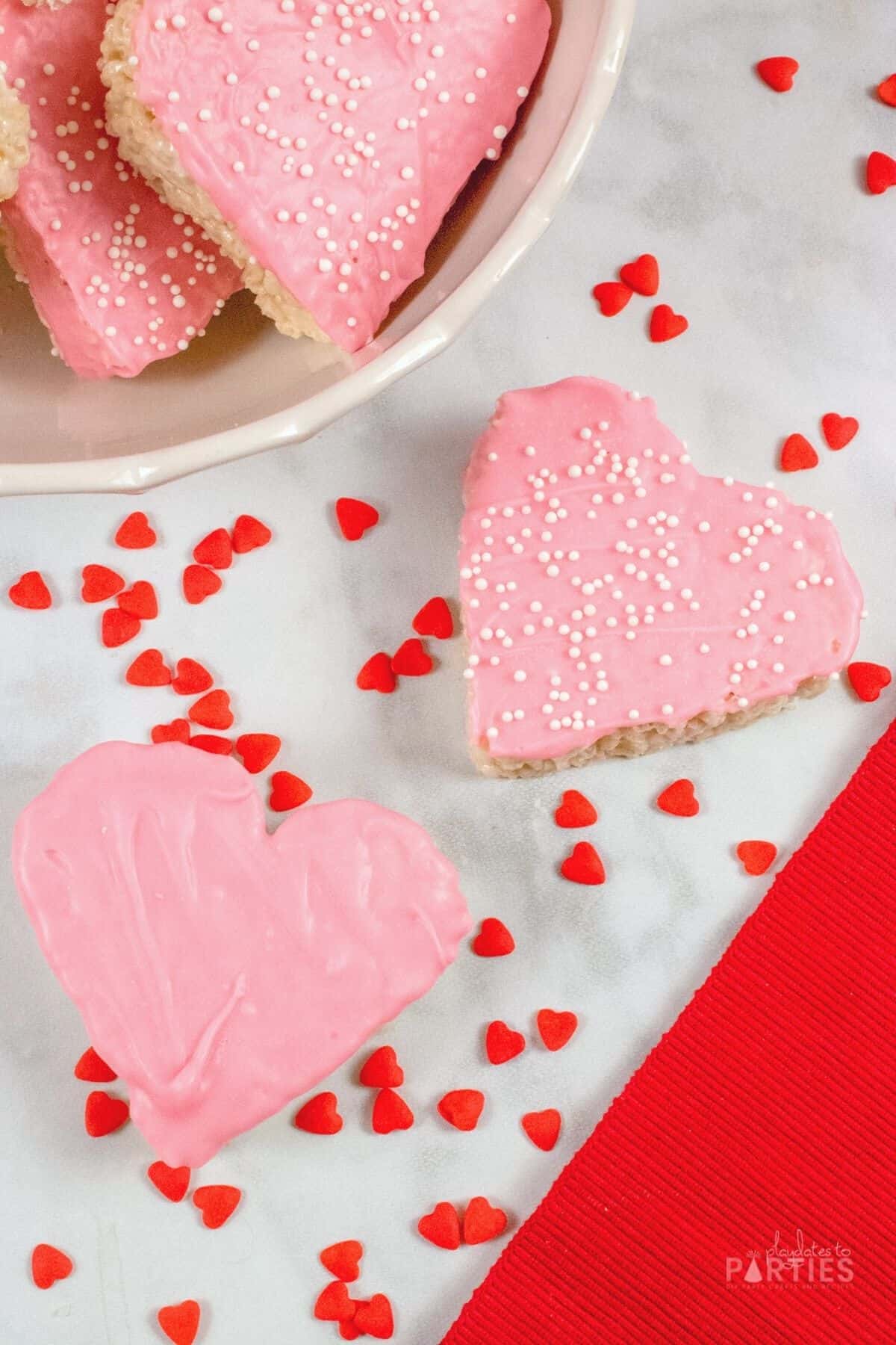 Pink Valentine rice krispie treats with sprinkles.