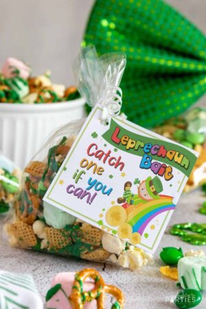 A Leprechaun bait printable tag on a bag of St. Patrick's Day snack mix.