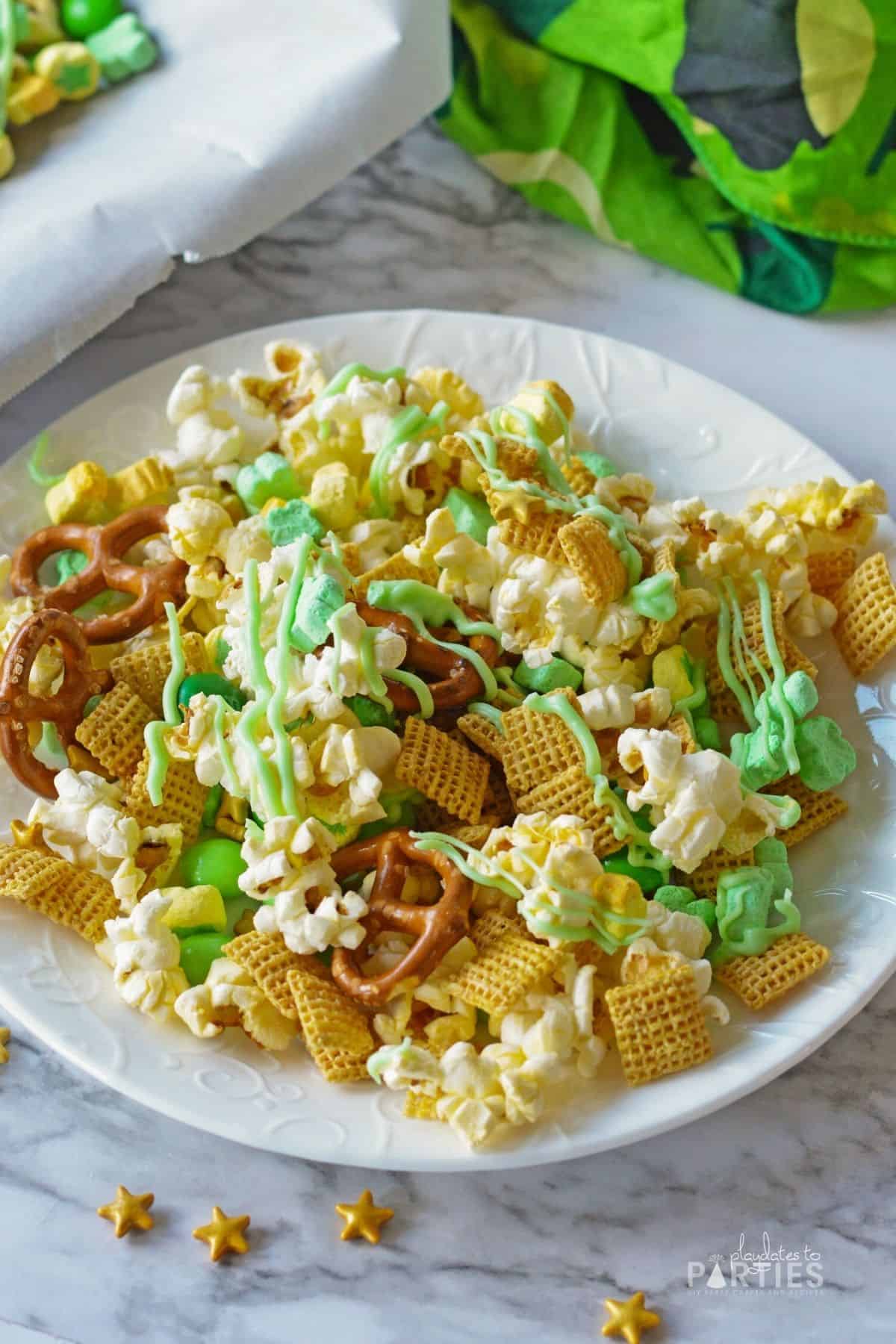 Leprechaun bait snack mix with large star sprinkles and light green chocolate.