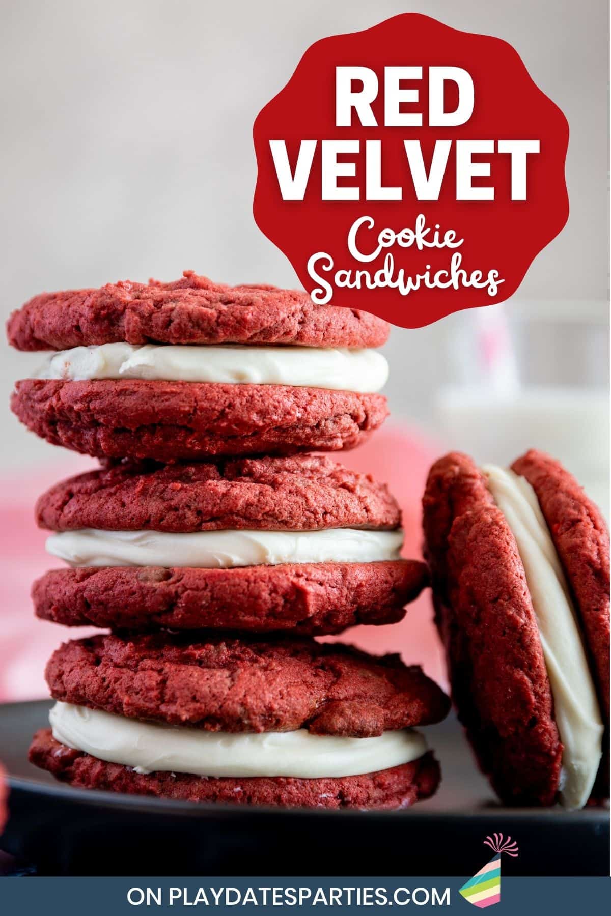 Cookies stacked on a plate in front of a glass of milk with text overlay red velvet cookie sandwiches.
