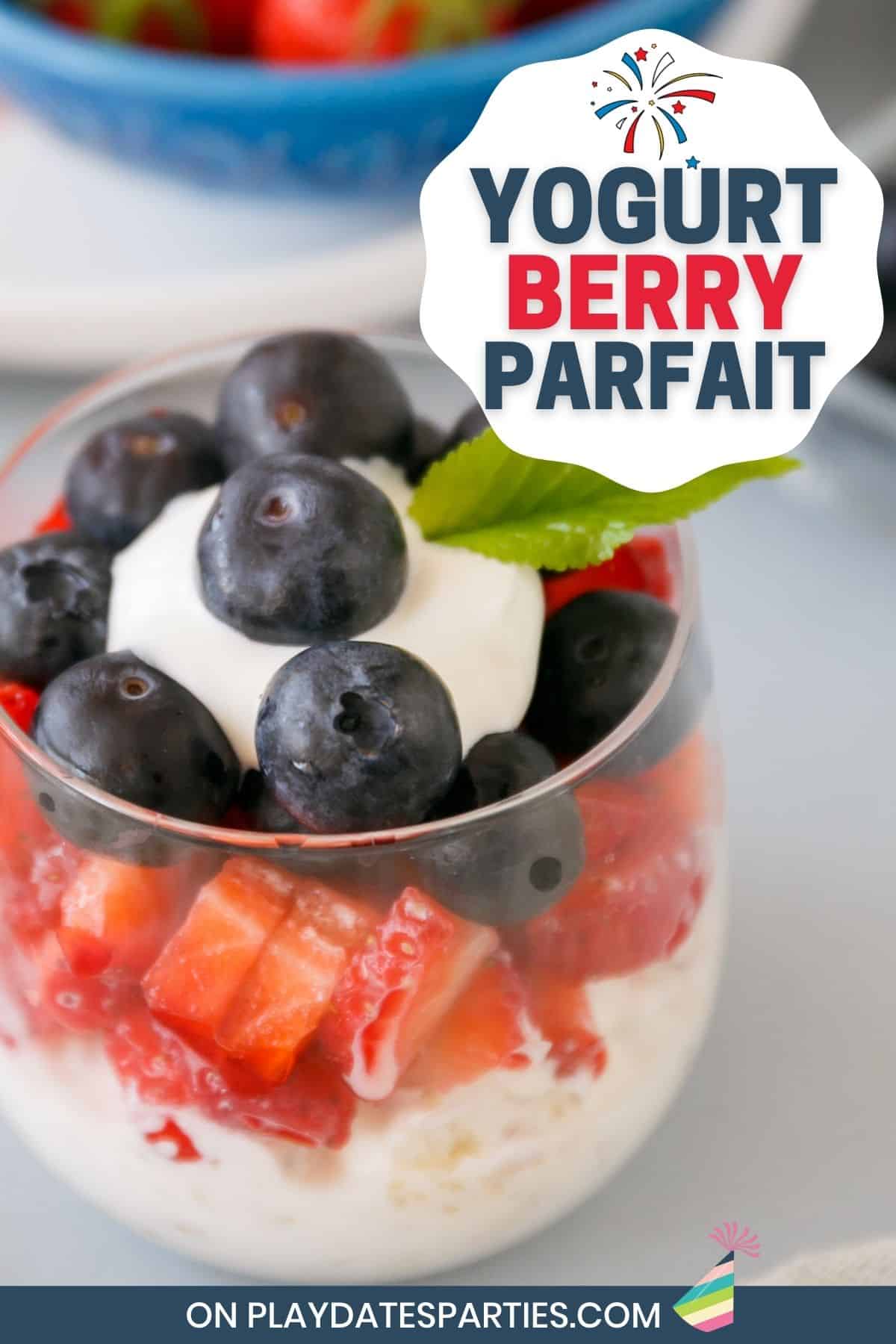 Red white and blue parfait for July 4th with text overlay Yogurt berry parfait.