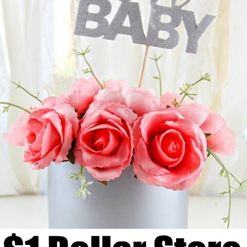 Baby shower centerpiece with flowers and an Oh Baby pick.