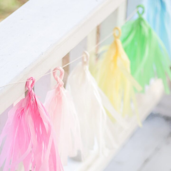 A tassel garland made with different colored tissue papers.