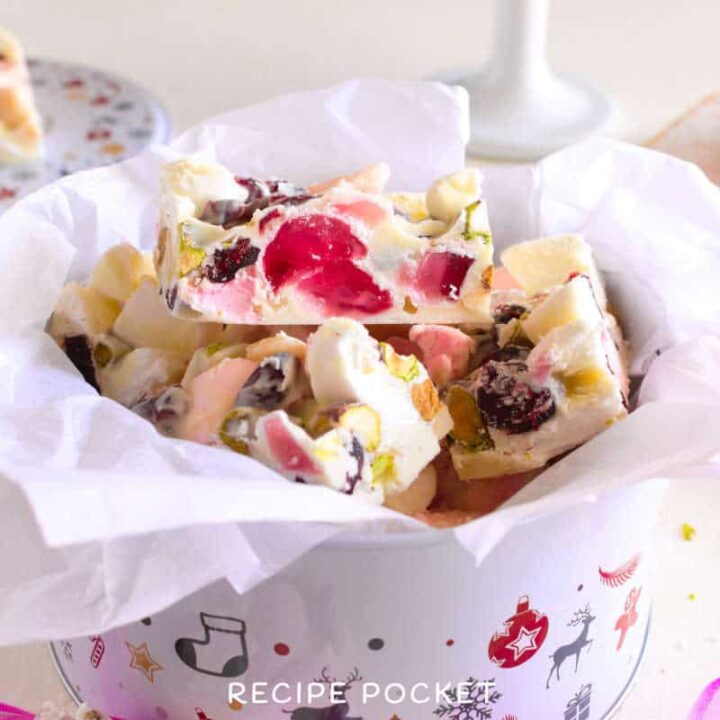 White chocolate rocky road candy pieces in a cookie tiin.