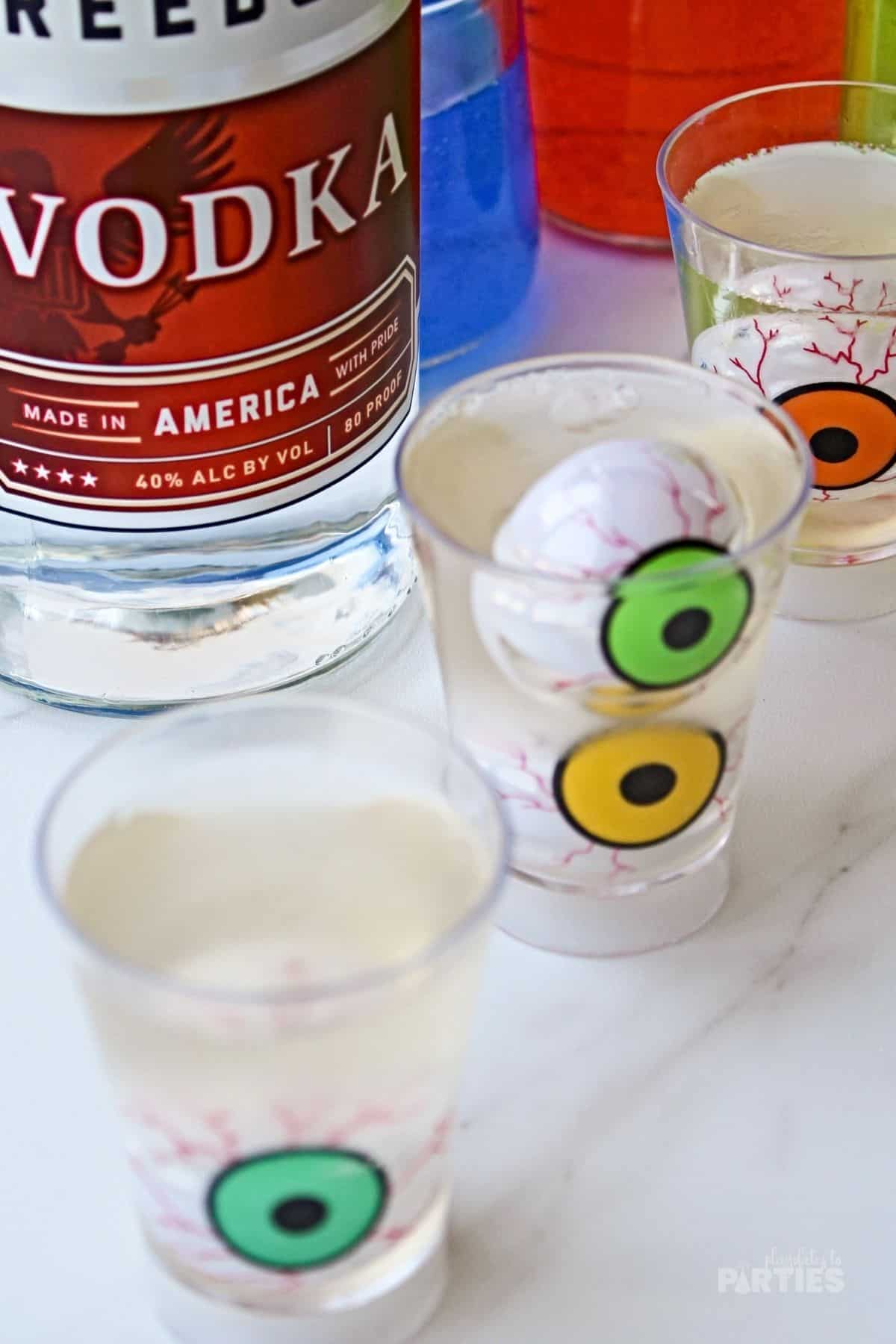 Floating eyeball jello shots made with vodka.