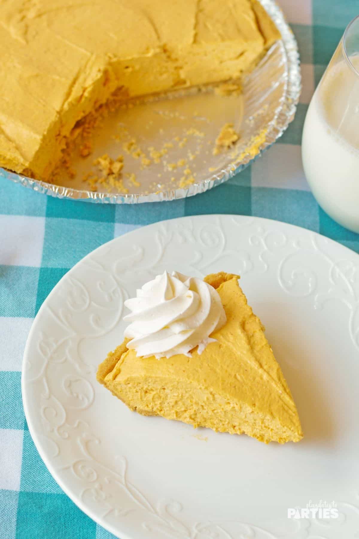 Using a pre made graham cracker crust makes this pumpkin cheesecake pie so easy!