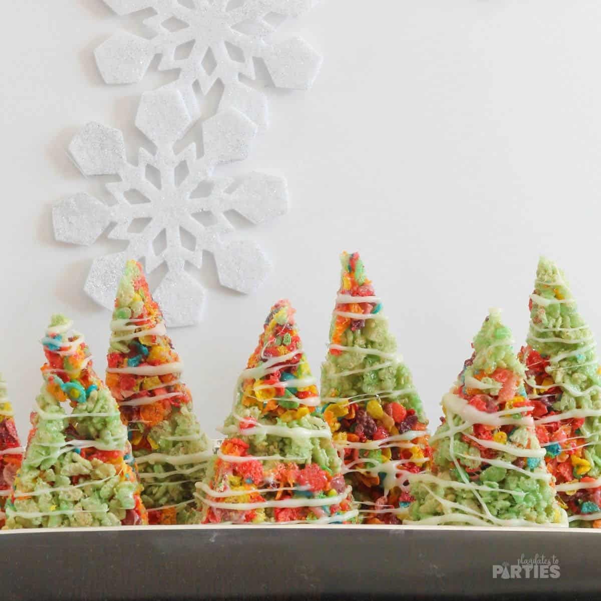 Colorful Rice Krispie Treats shaped like Christmas Trees.