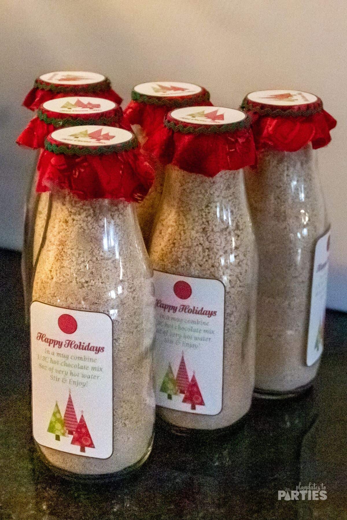 DIY hot chocolate favor bottles.