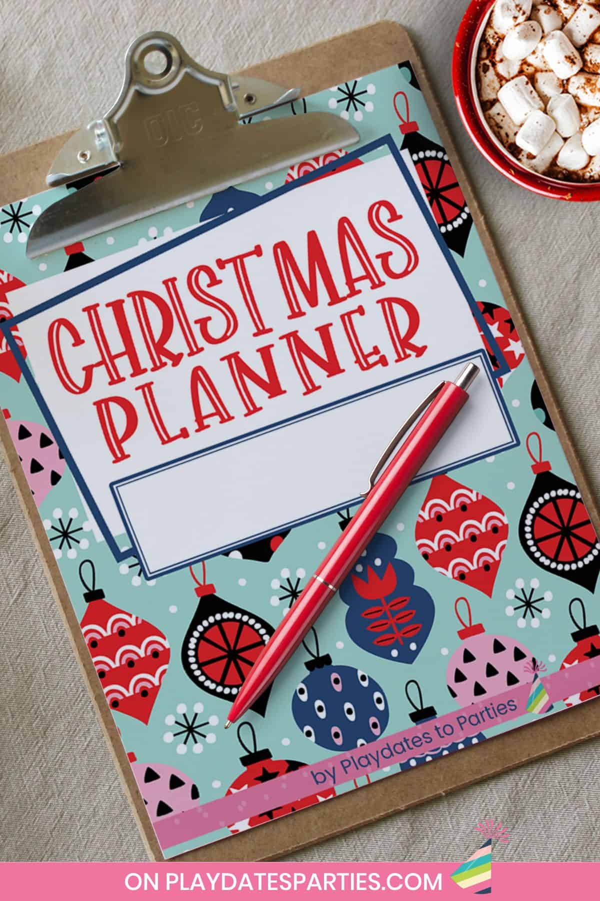 Printed Christmas planner on a clipboard.