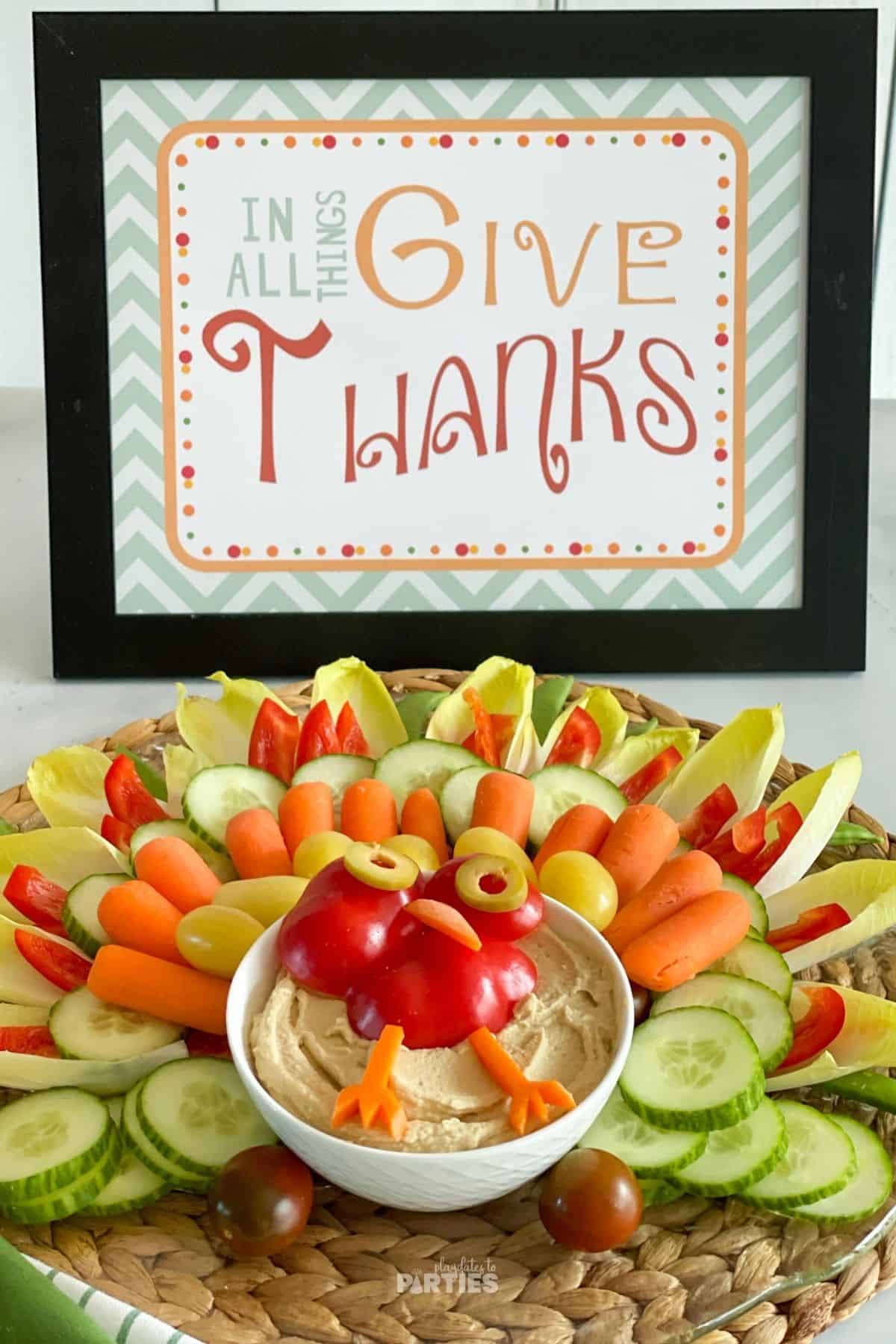 Thanksgiving veggie turkey tray with a Give Thanks sign.
