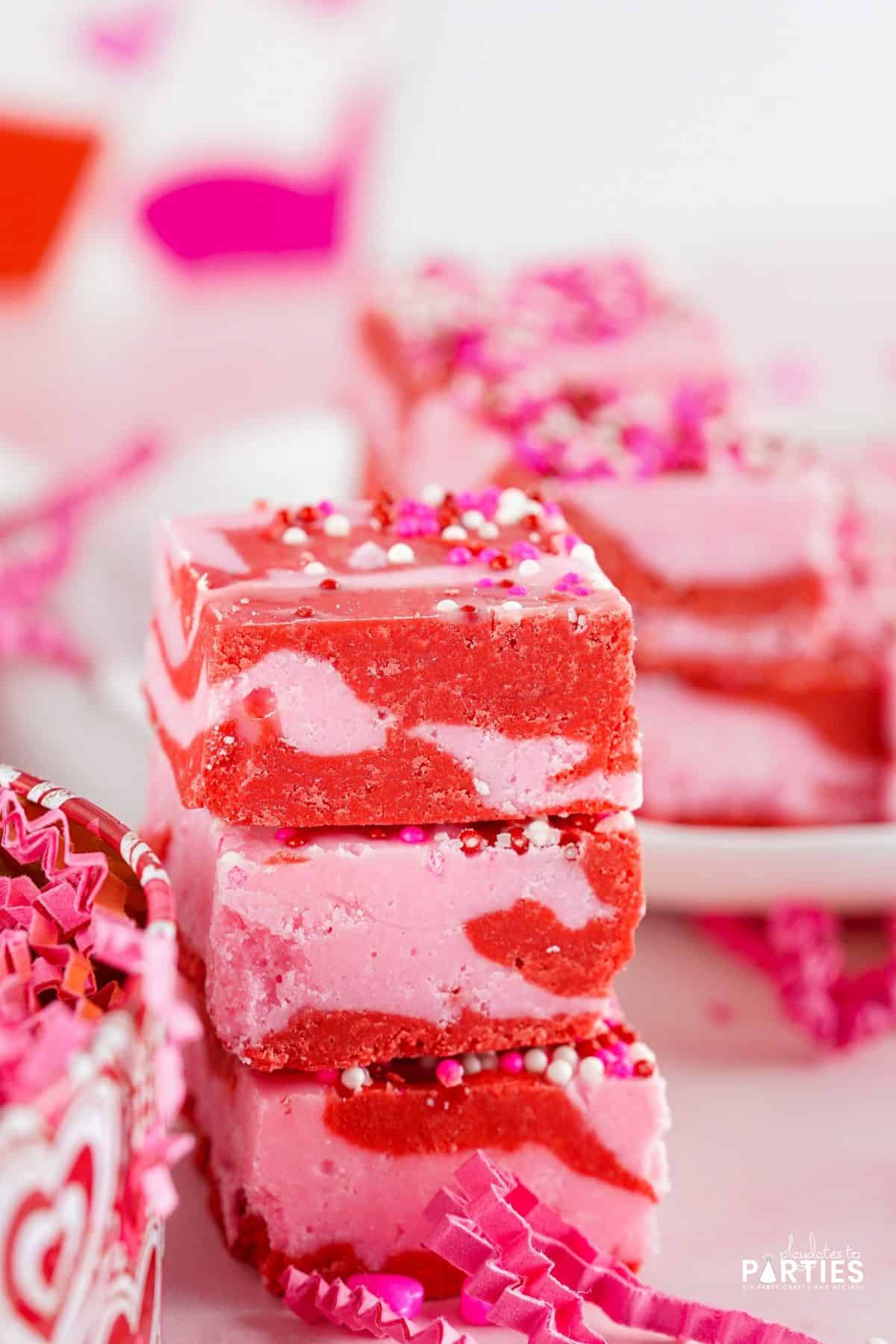 A stack of pink and red valentine candy.