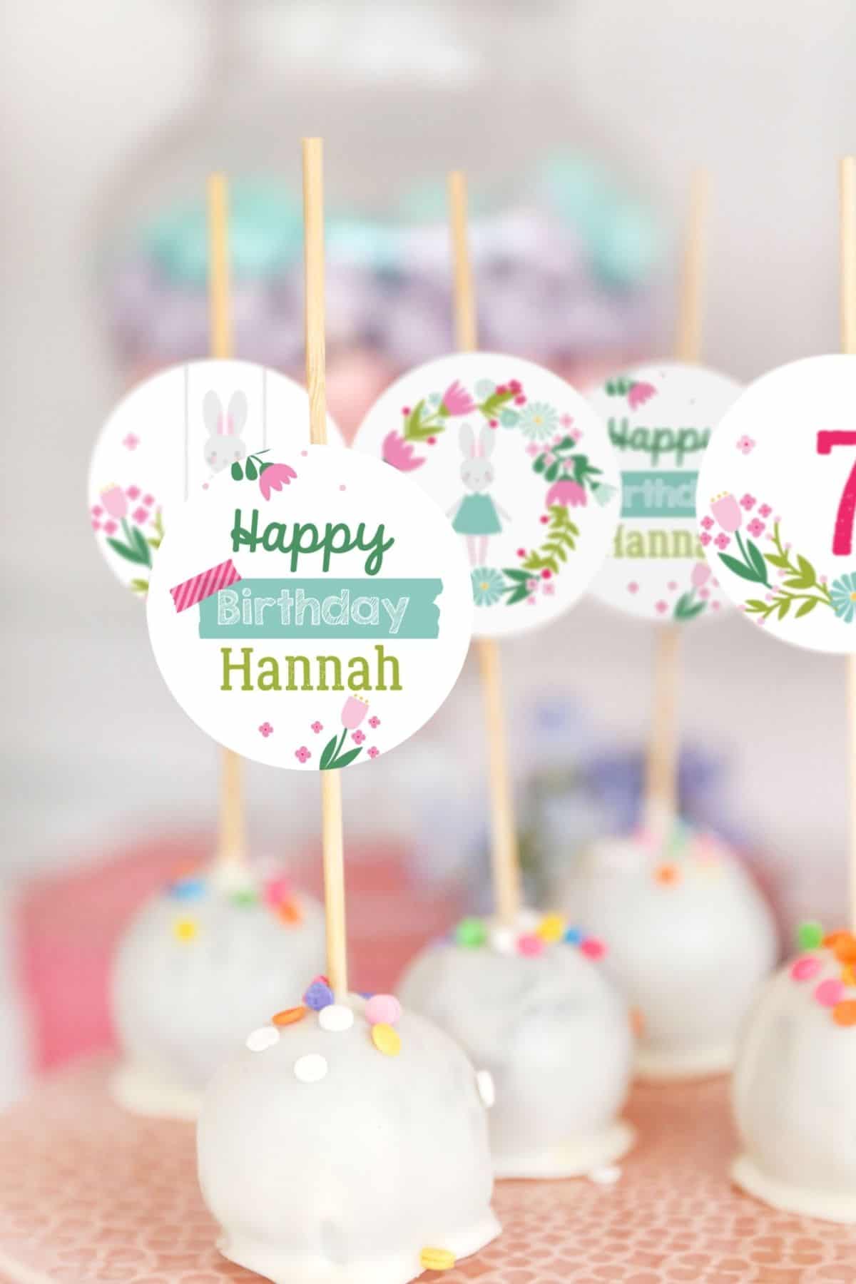 Cake pops with spring themed printable party circles.
