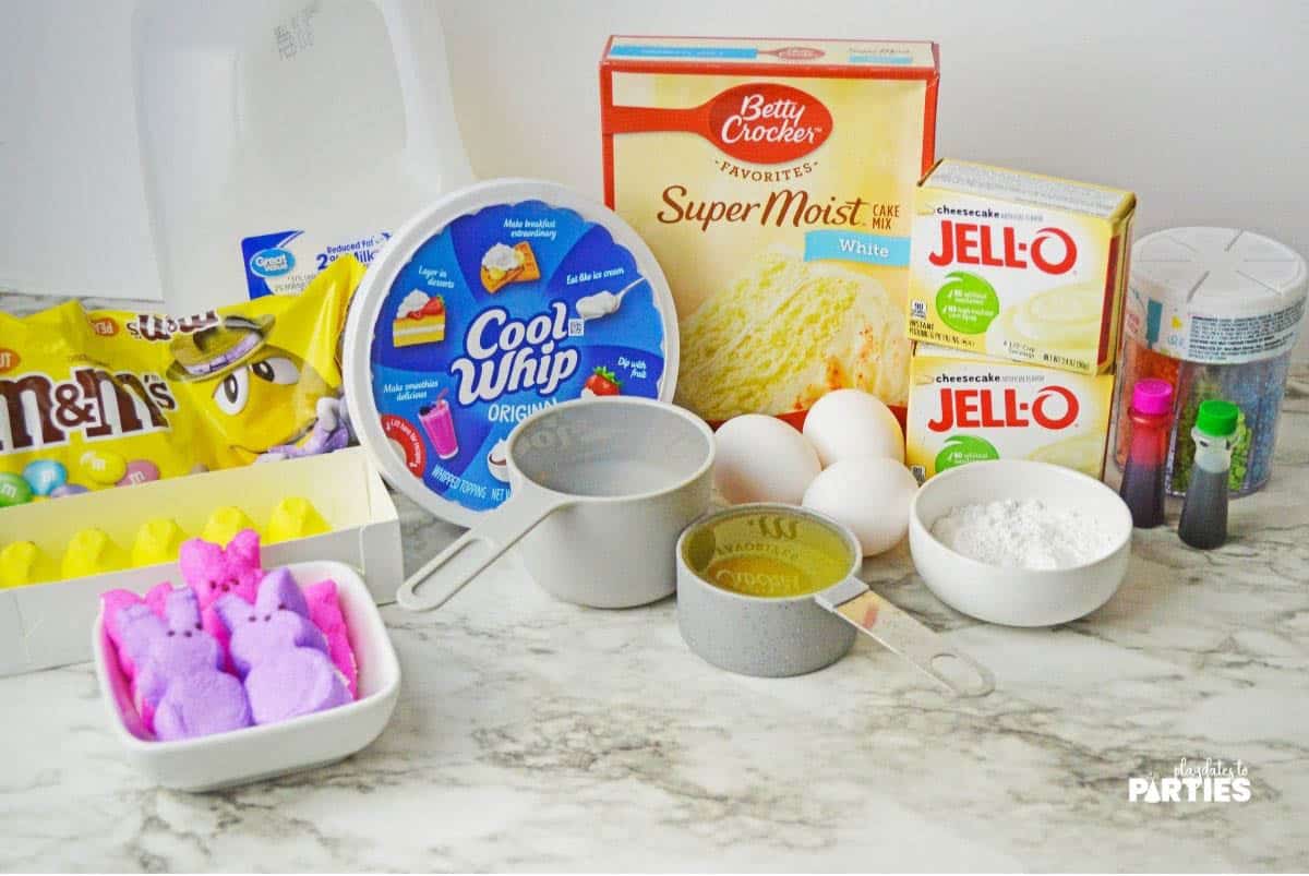 Ingredients for an Easter poke cake with Peeps.