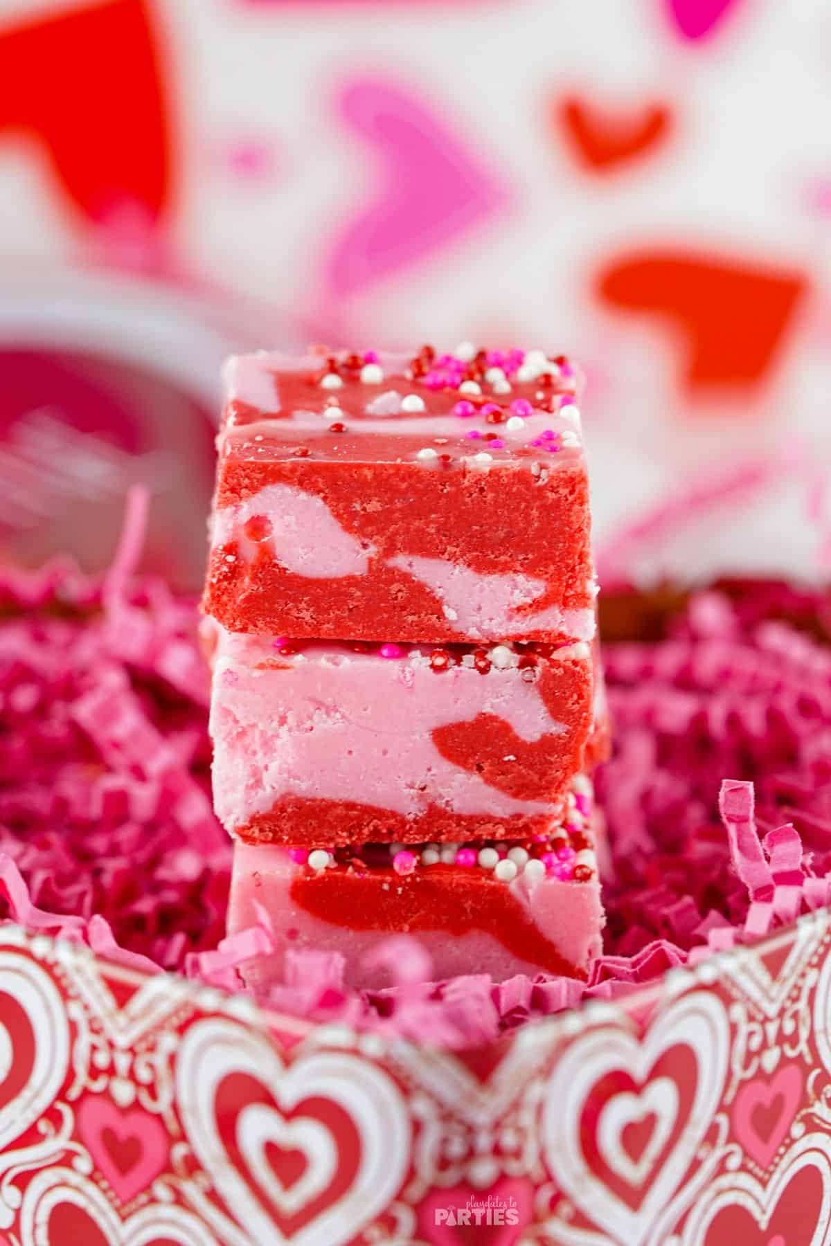 Strawberry fudge made with pink and red layers.