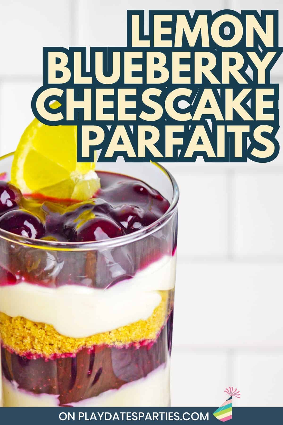 A parfait made with layers of blueberry, cheesecake, and graham crackers.