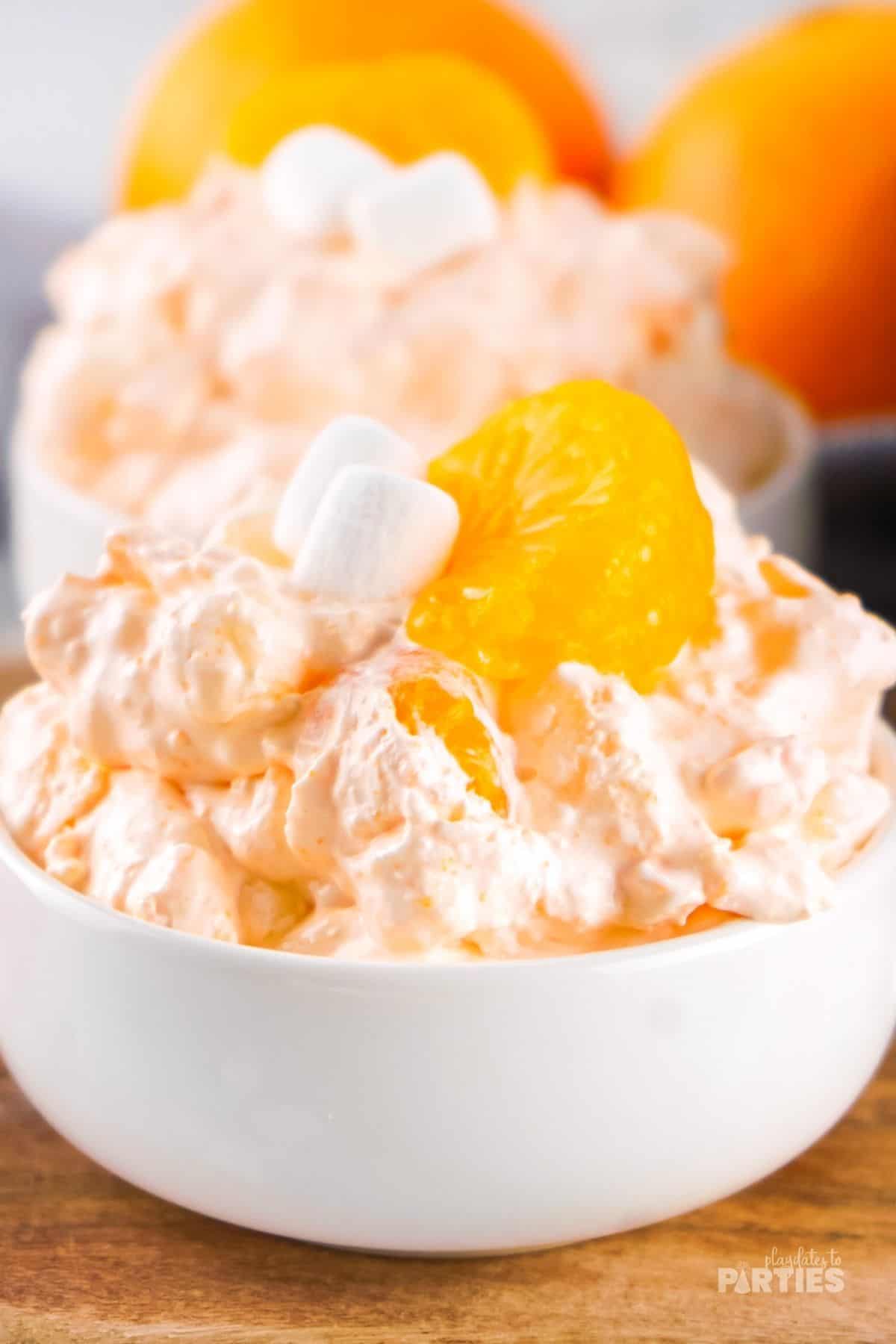 Creamy orange fluff in a white bowl.