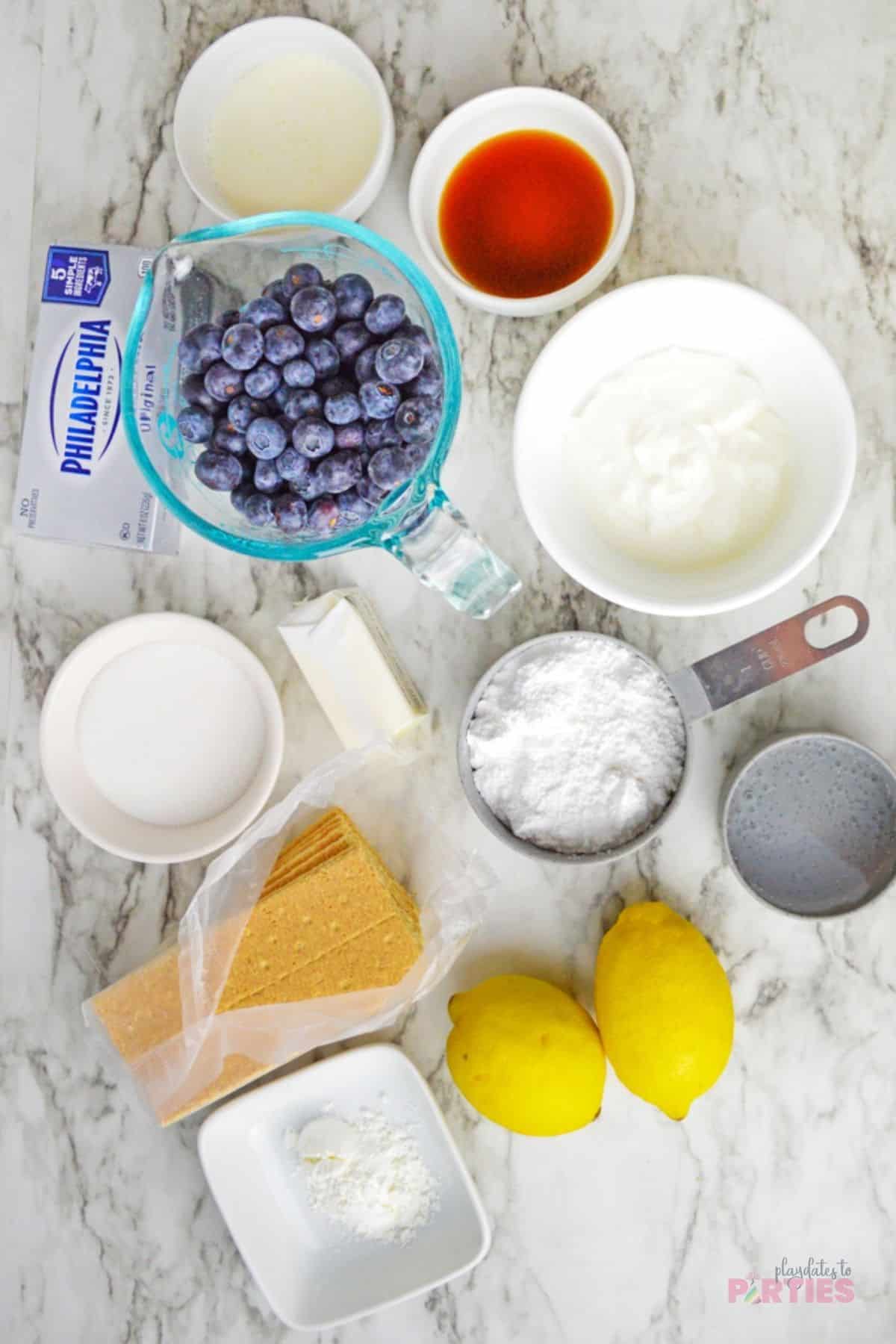 Ingredients for lemon blueberry cheesecake parfaits.