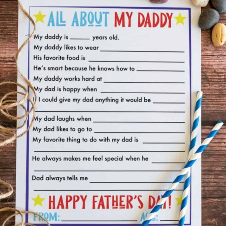 Free printable Father's Day interview sheet on a wood surface.