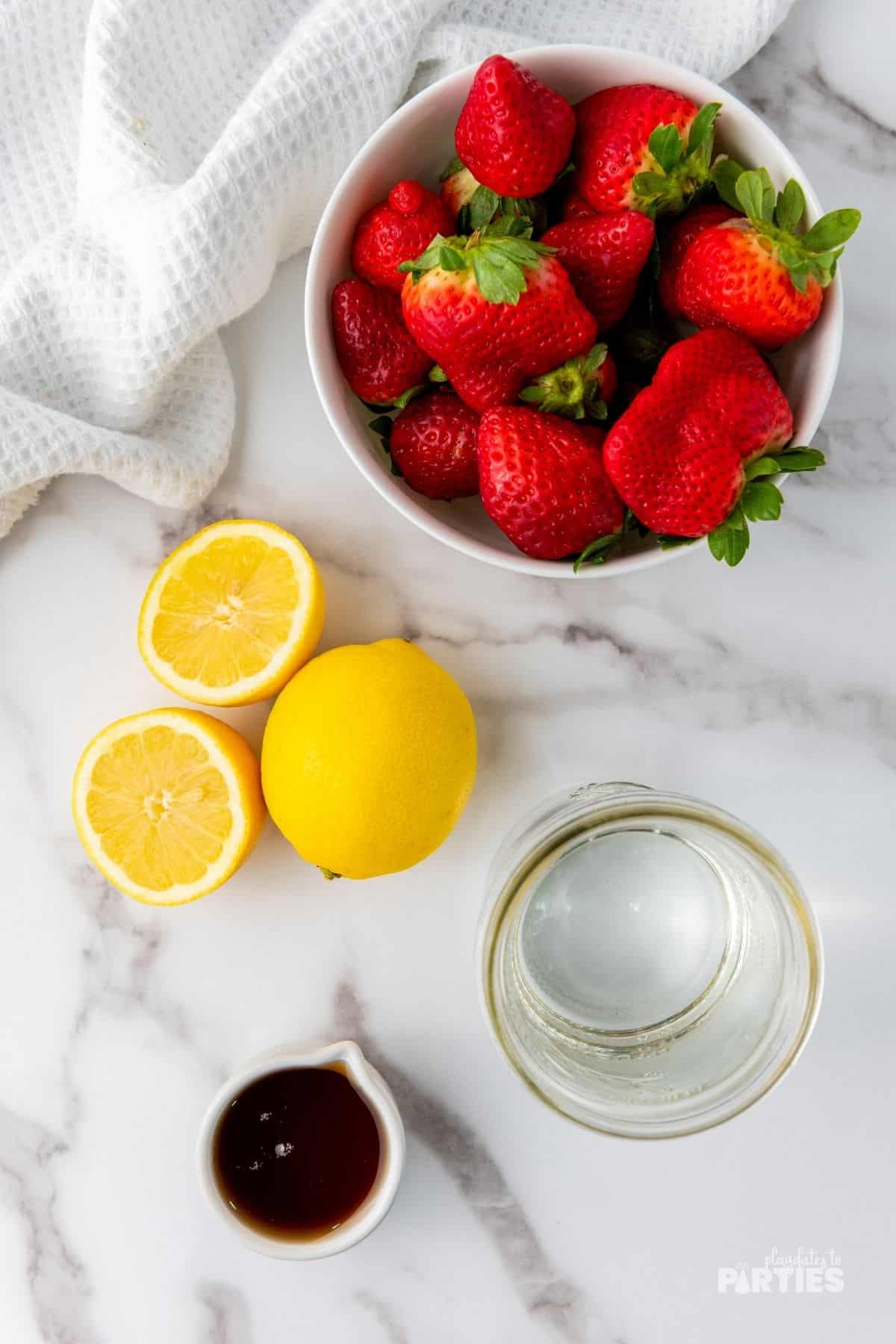 Ingredients include fresh strawberries, lemons, agave syrup, and water.