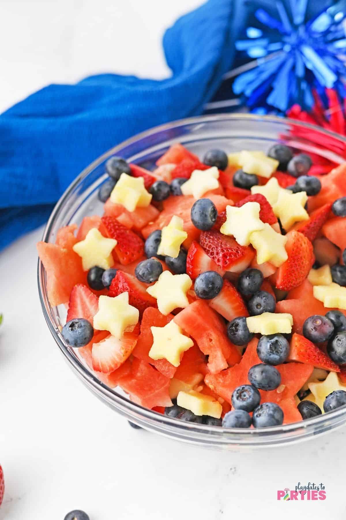 Layers of watermelon stars, apple stars, blueberries, and strawberries make a perfectly patriotic side dish.