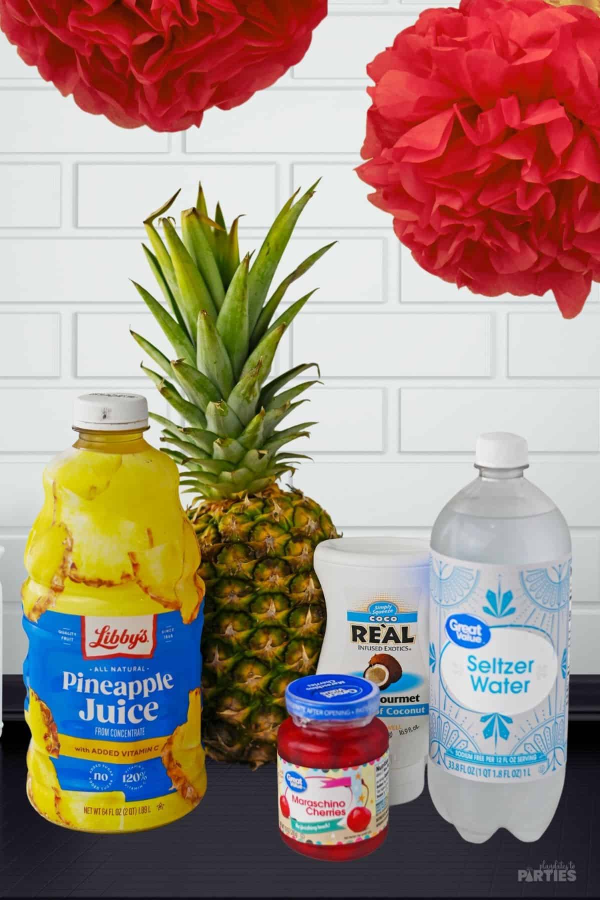Ingredients include pineapple juice, seltzer water, coconut cream, and cherries.