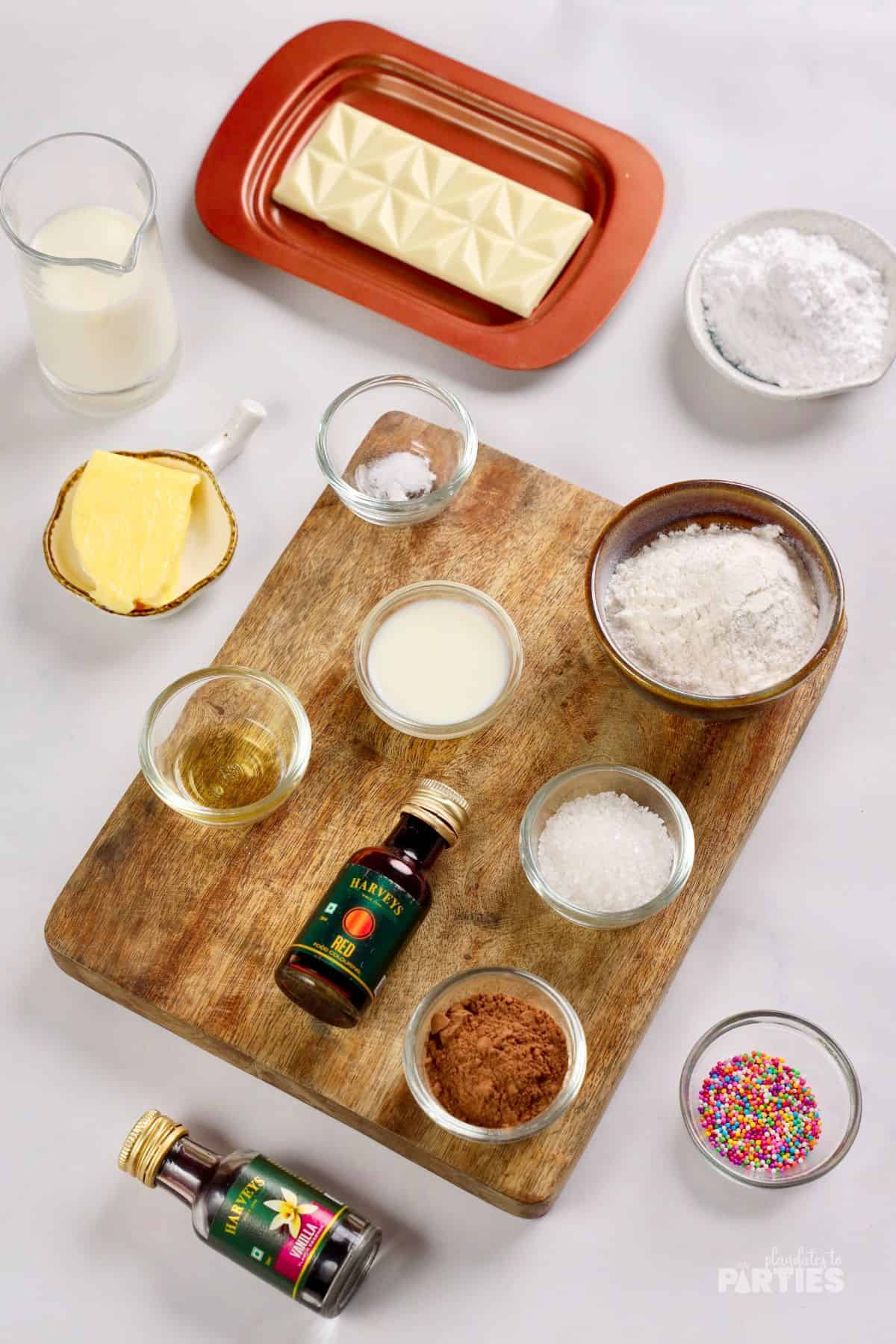 Baking ingredients on a white surface.