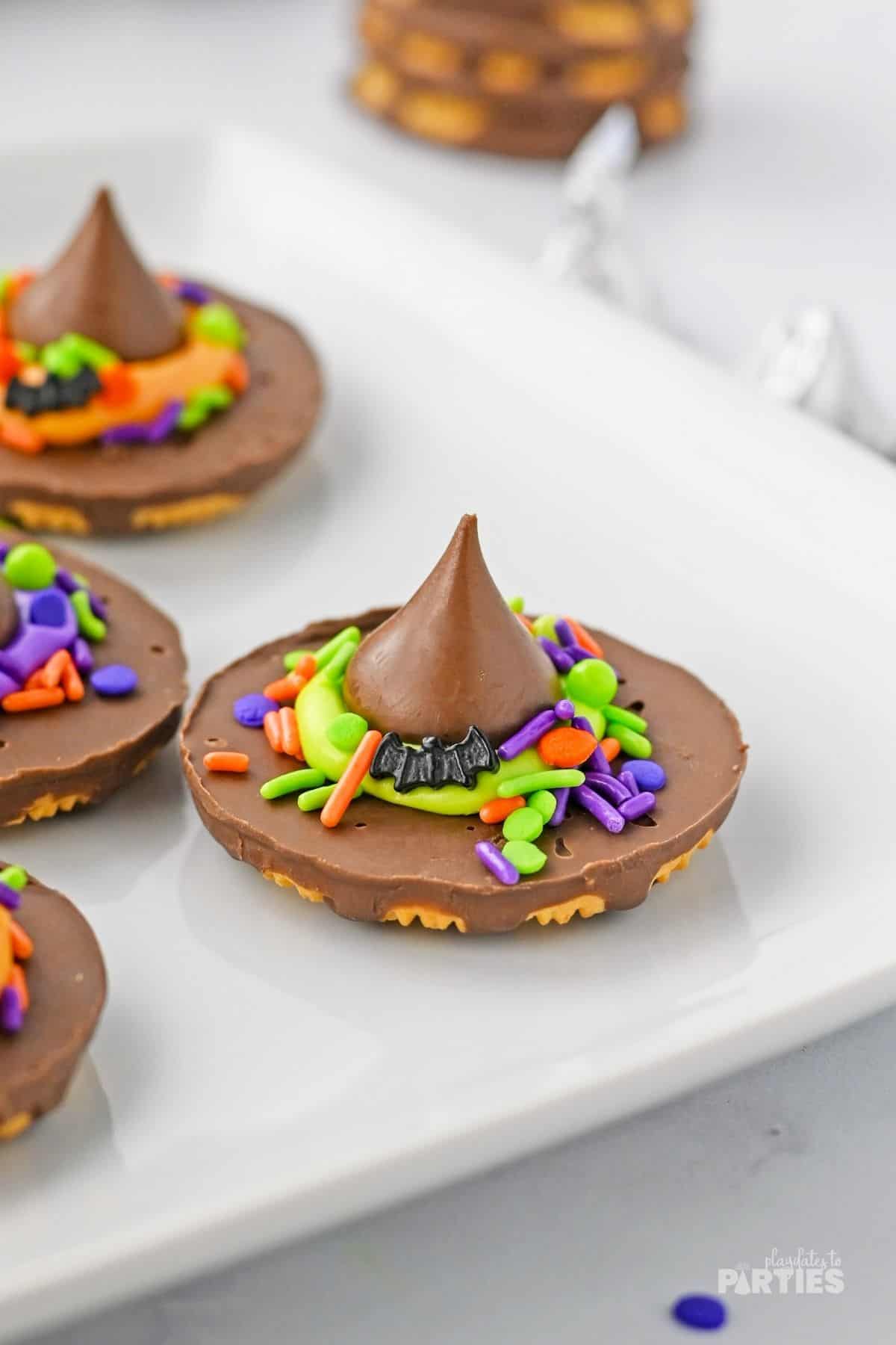 Easy no bake witches hat cookies are ready for kids to devour.