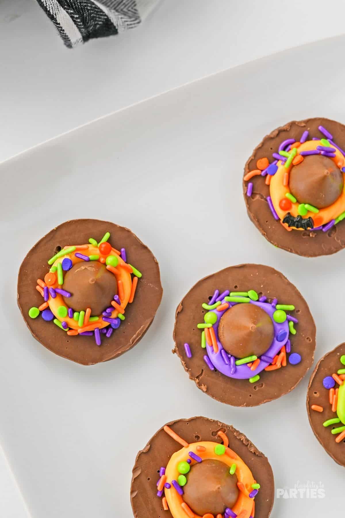 From above, you can see the Hershey's Kisses and colorful icing on top of fudge stripe cookies.