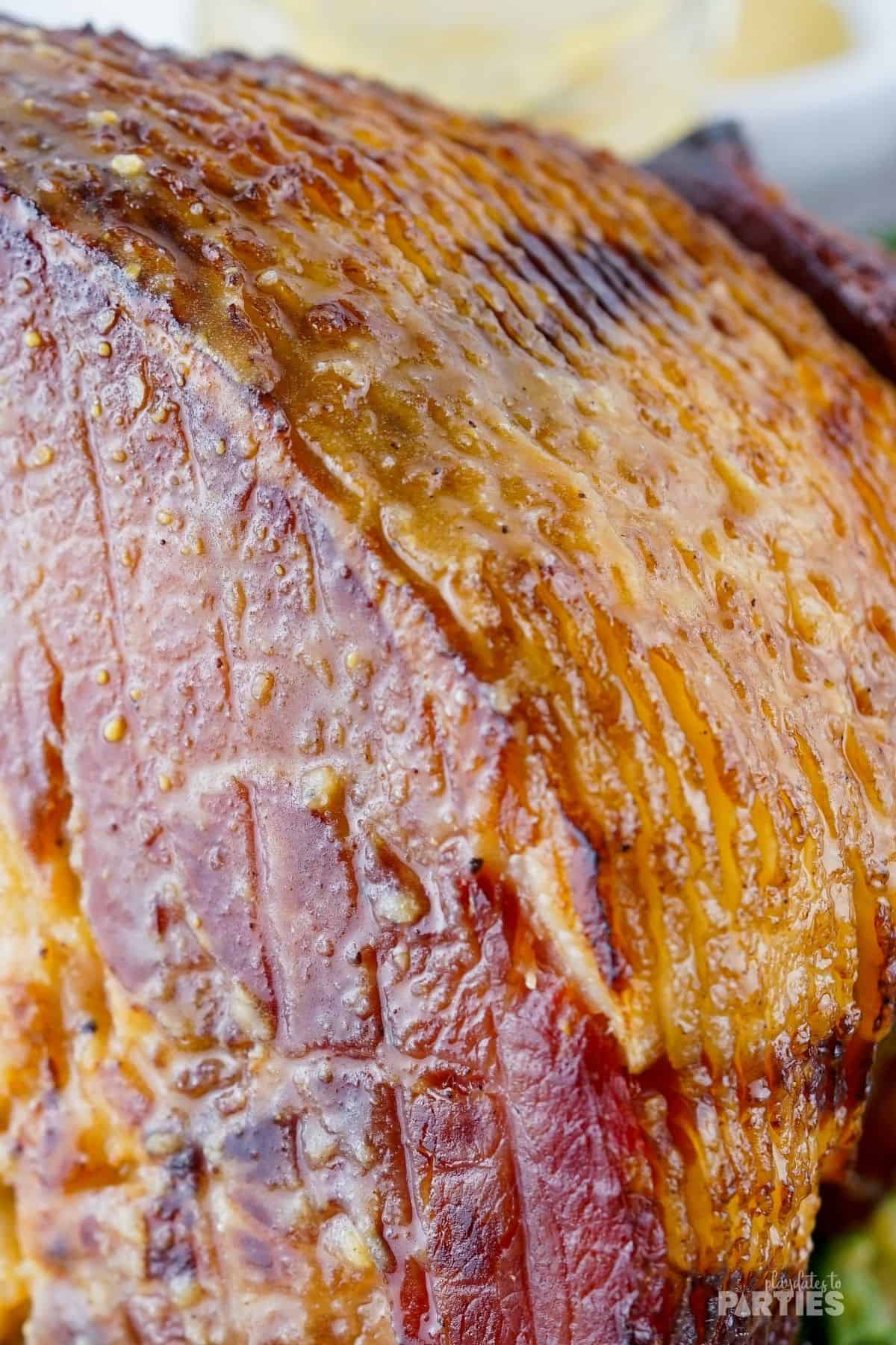When you look close up the ham glistens with glaze.
