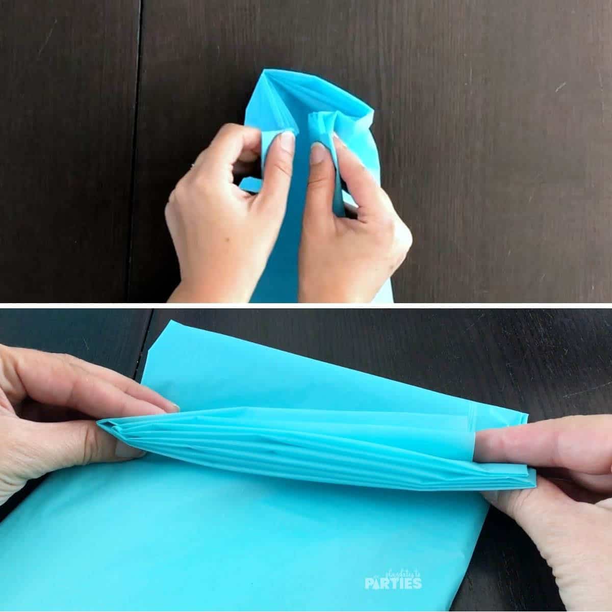 Folding the plastic tablecloth so all folds are together.