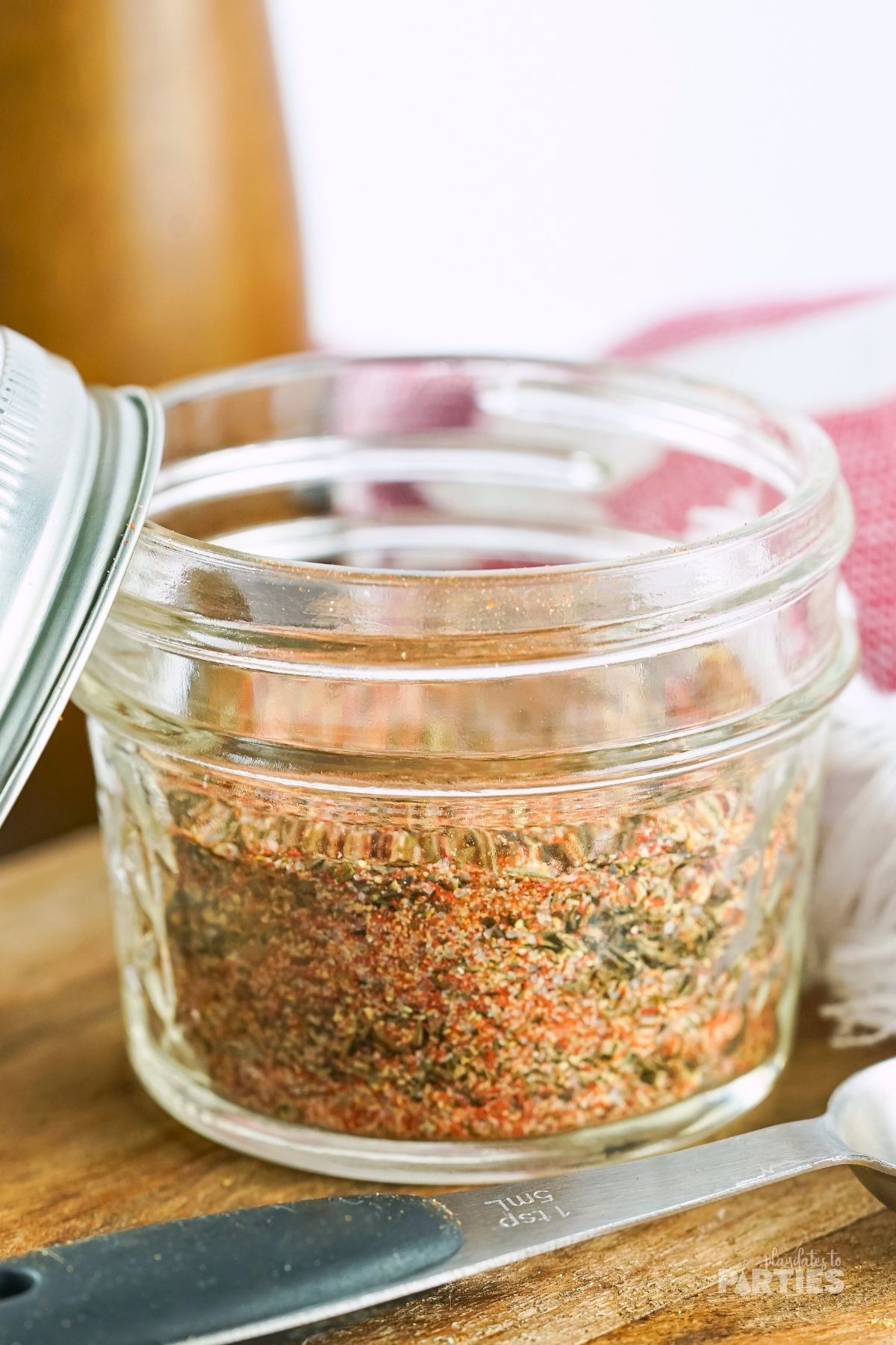 A mini canning jar filled with steak rub.