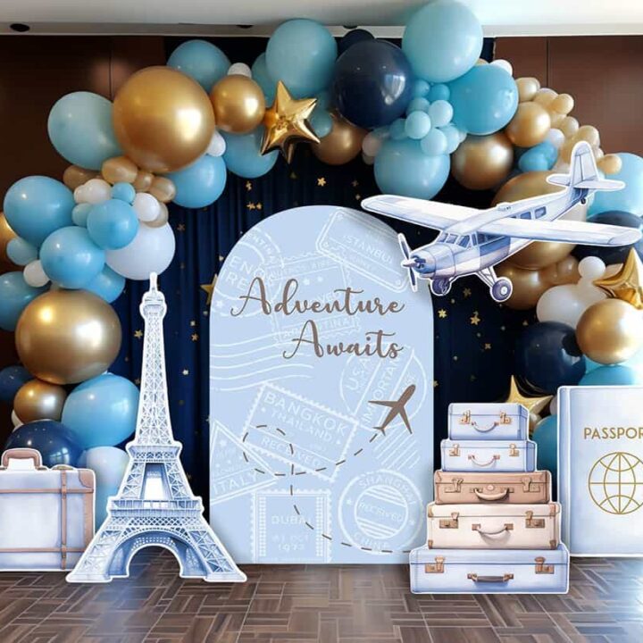 Adventure awaits party backdrop with a blue theme for a boy baby shower.