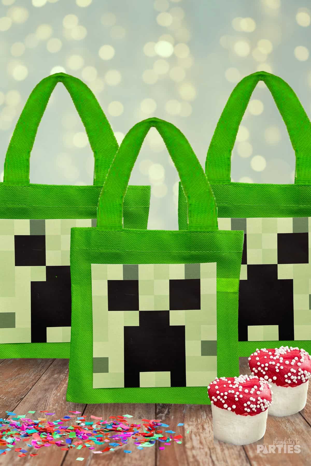 Three Minecraft favor bags on a party table with marshmallow mushrooms in front.