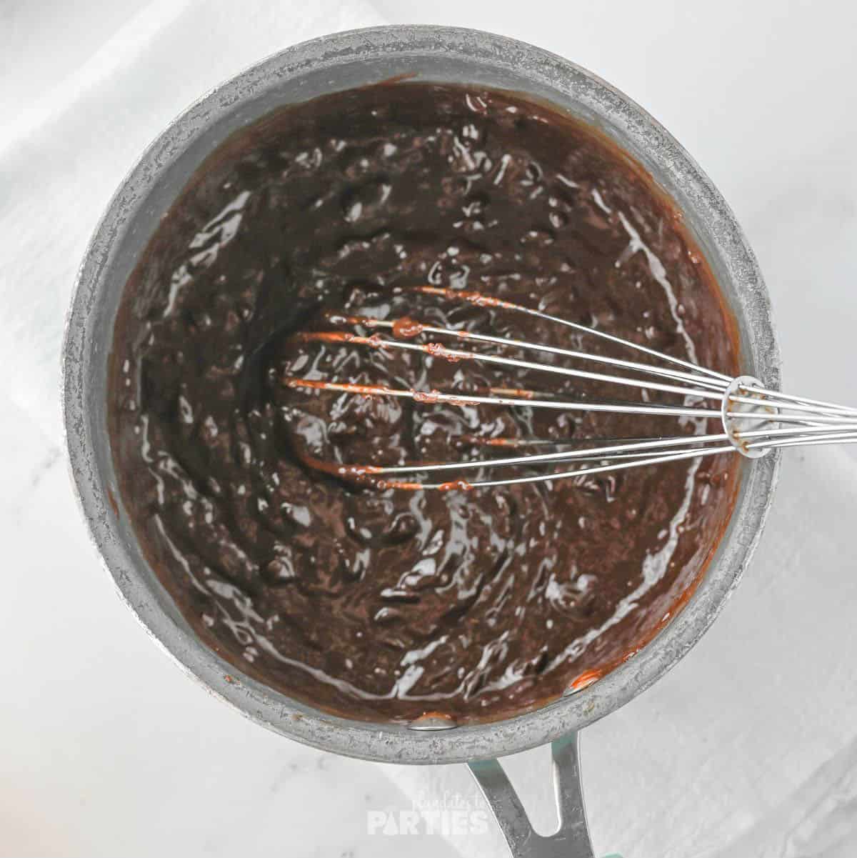 Eggs and coffee grounds mixed into the chocolate mixture.