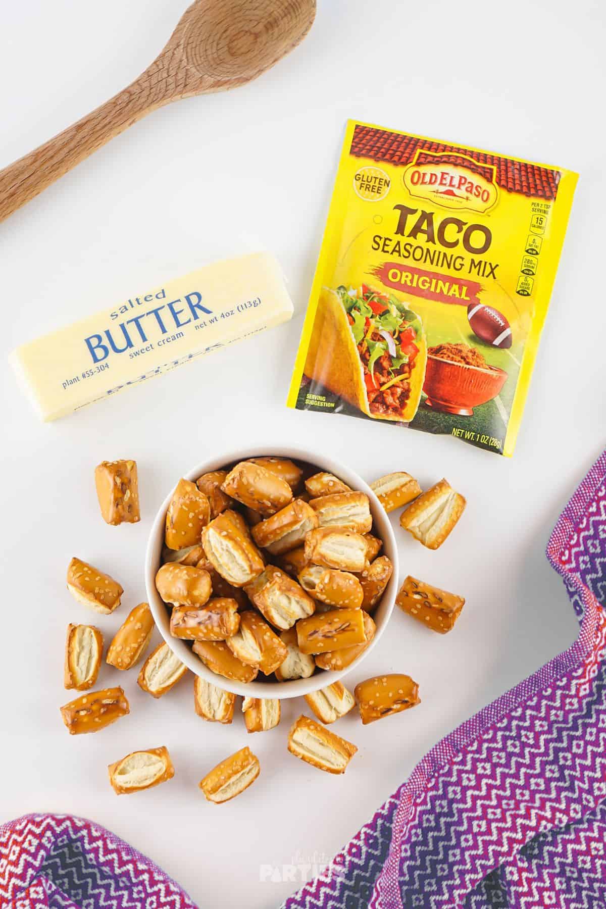 Ingredients include sourdough pretzel bites, taco seasoning, and butter.